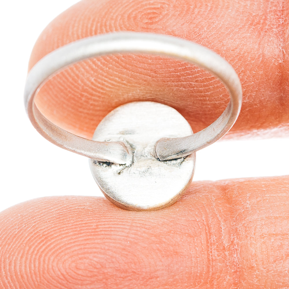 Sterling silver ring band interior, smooth rounded underside with small marks