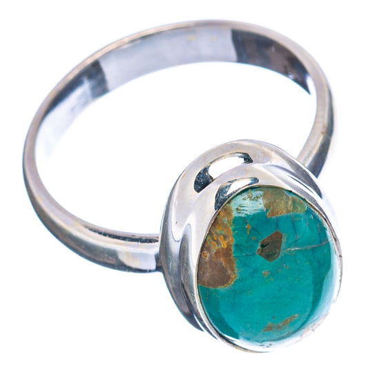 Sterling silver turquoise cabochon ring with oval stone in round setting