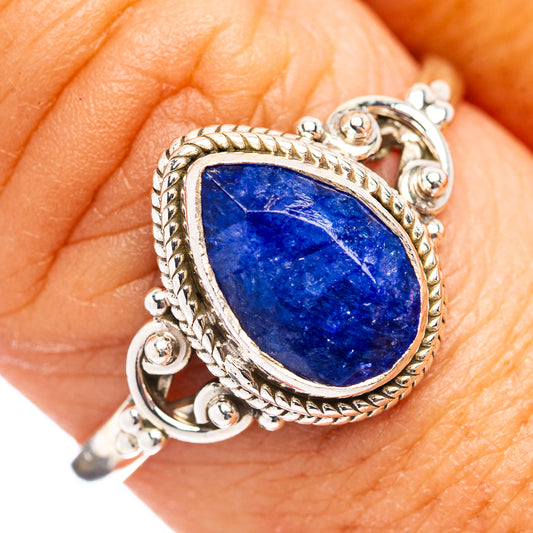 Sterling silver ring with oval blue sillimanite gemstone and ornate rope bezel details