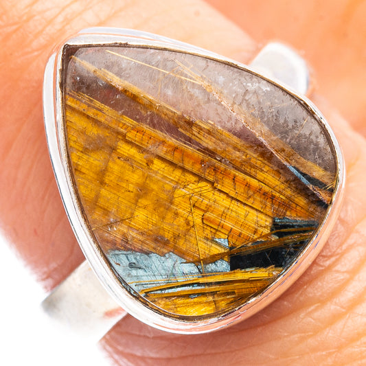 Sterling silver ring with close-up oval golden rutilated quartz cabochon detail