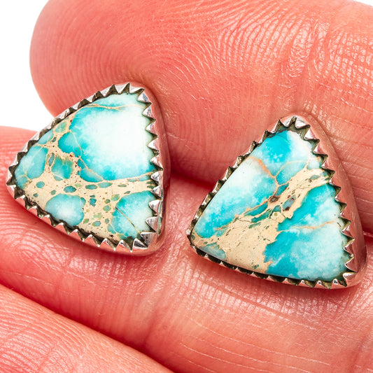 Sterling silver triangle earrings featuring turquoise jasper inlay and serrated edge