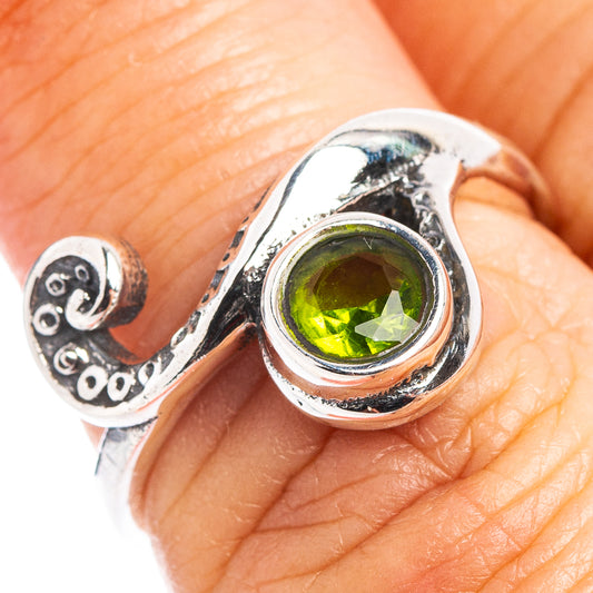 Sterling silver dainty wave ring with round peridot-green gemstone, size 6.5