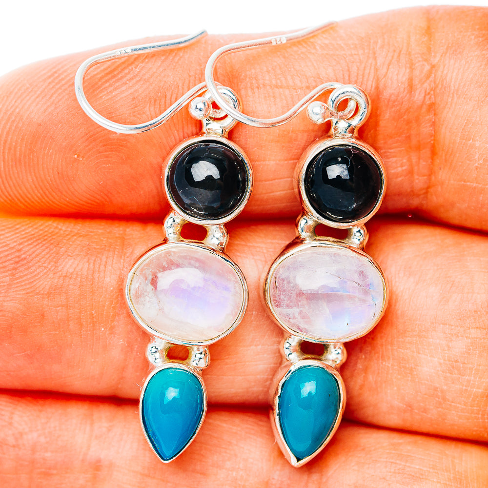 925 sterling silver drop earrings with black stones, iridescent moonstone rounds, and blue teardrop accents