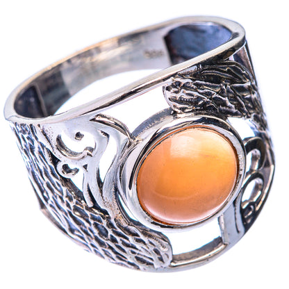 Sterling silver moonstone ring, oval peach cabochon, ornate engraved side details