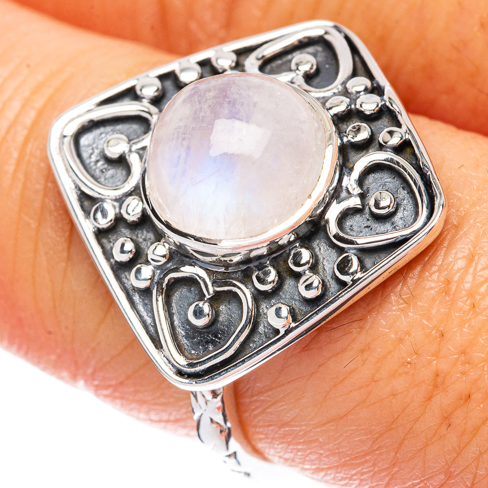 925 sterling silver moonstone ring with oval rainbow moonstone and heart motif bezel