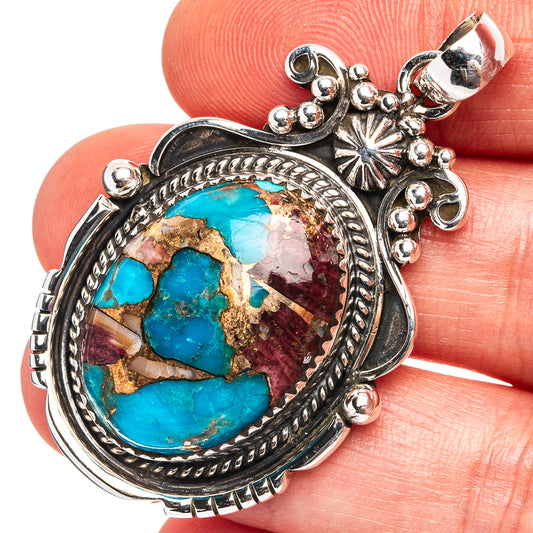 Turquoise coral matrix oval pendant in .925 sterling silver with ornate bezel
