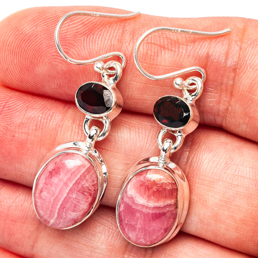 Sterling silver drop earrings with pink oval rhodochrosite and dark garnet stones