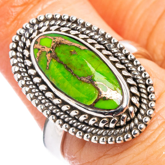 Sterling silver turquoise ring with oval green copper stone and beaded band