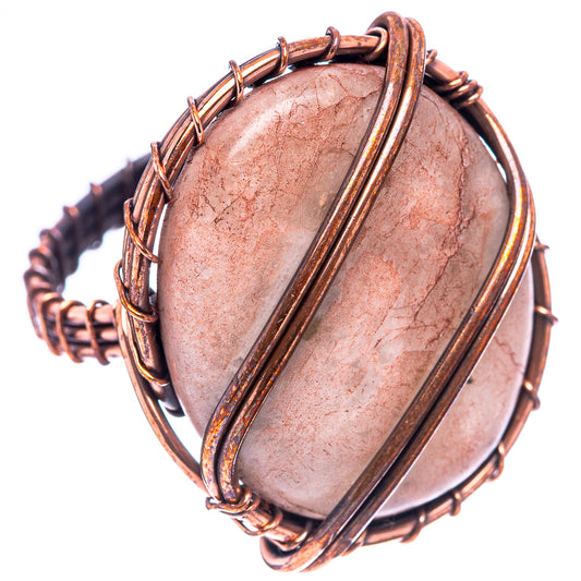 Quartz ring size 8 with oval pink quartz and oxidized copper wire bezel, top view