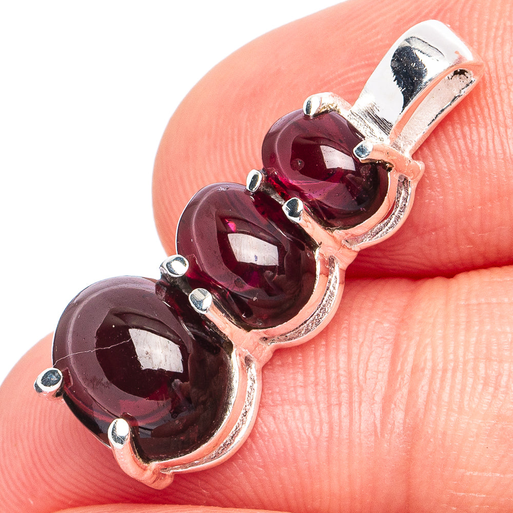 Garnet pendant with three round dark red gemstones in 925 sterling silver setting