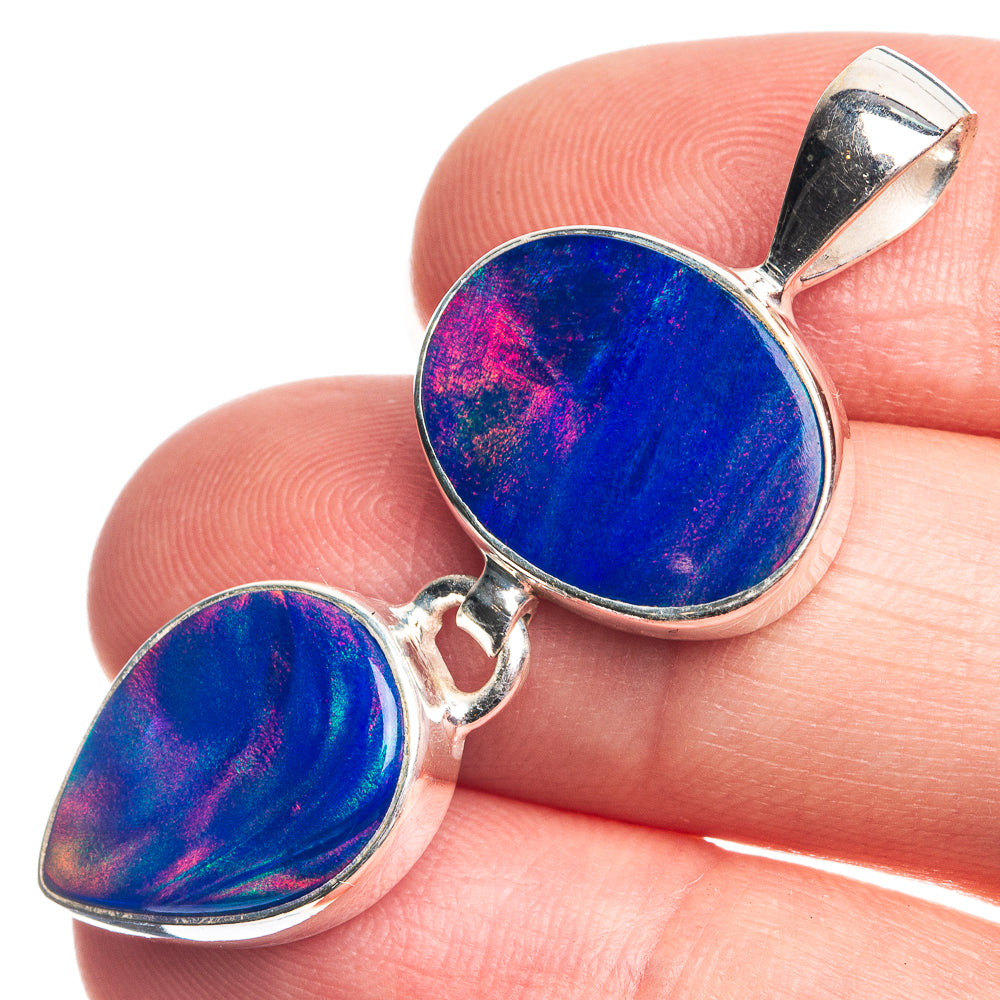 Sterling silver pendant with two blue opal cabochons: round and teardrop settings