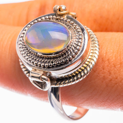 Sterling silver opal ring with oval Ethiopian opal, bead and rope bezel detail