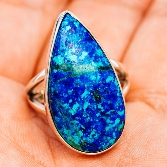 Sterling silver ring with upright blue teardrop gemstone, green speckled pattern
