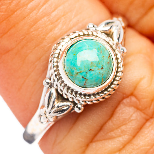 Sterling silver turquoise cabochon ring with rope bezel and leaf-like details