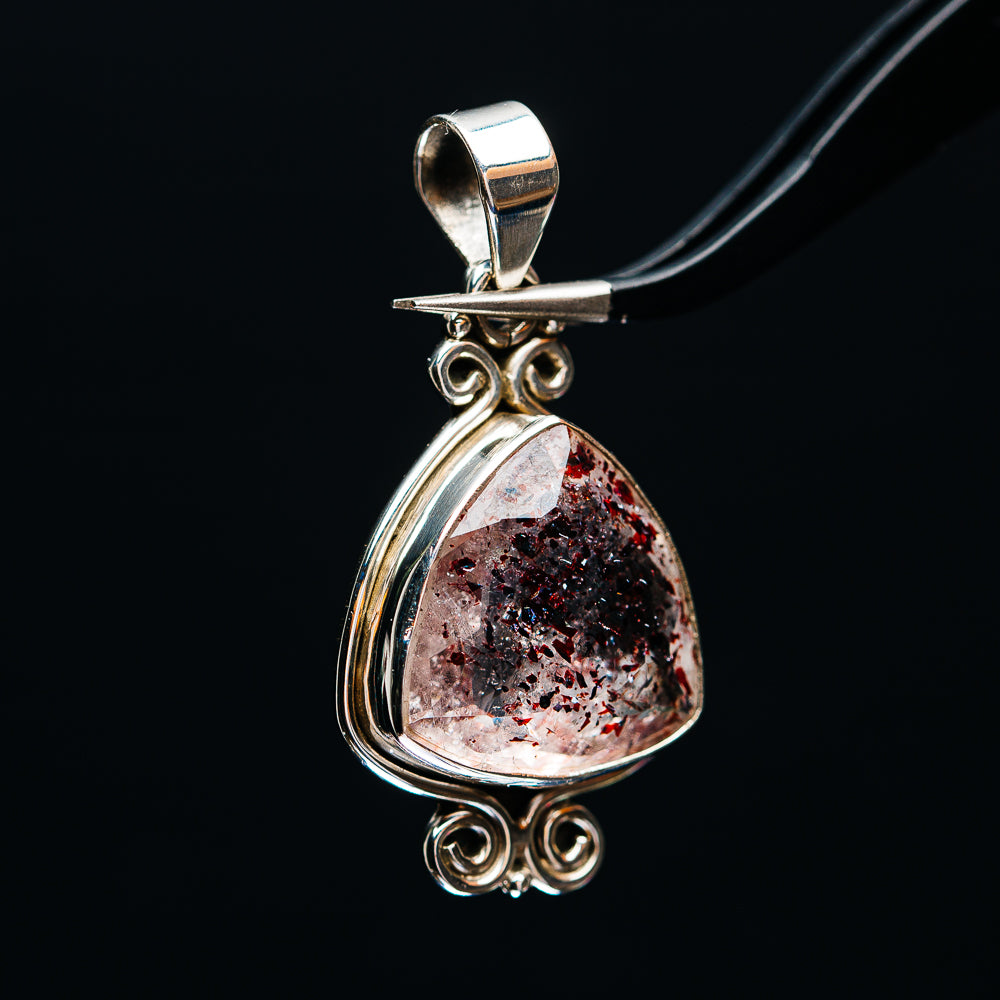 Teardrop lepidocrocite pendant with .925 sterling silver bail and filigree
