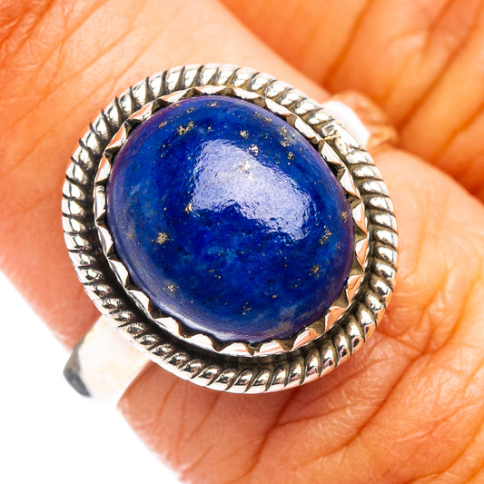 Sterling silver ring with round blue lapis lazuli cabochon and rope bezel
