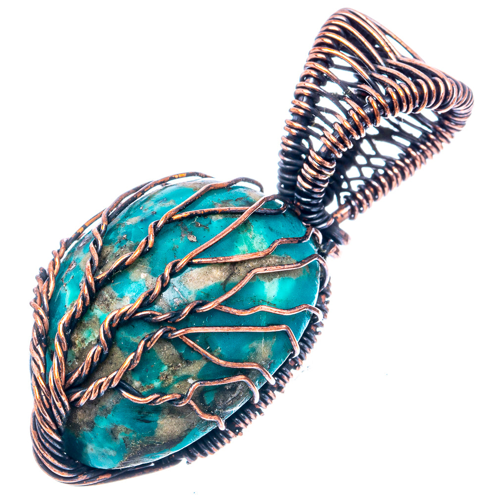 Turquoise stone pendant with oxidized copper wire wrap and tree of life design