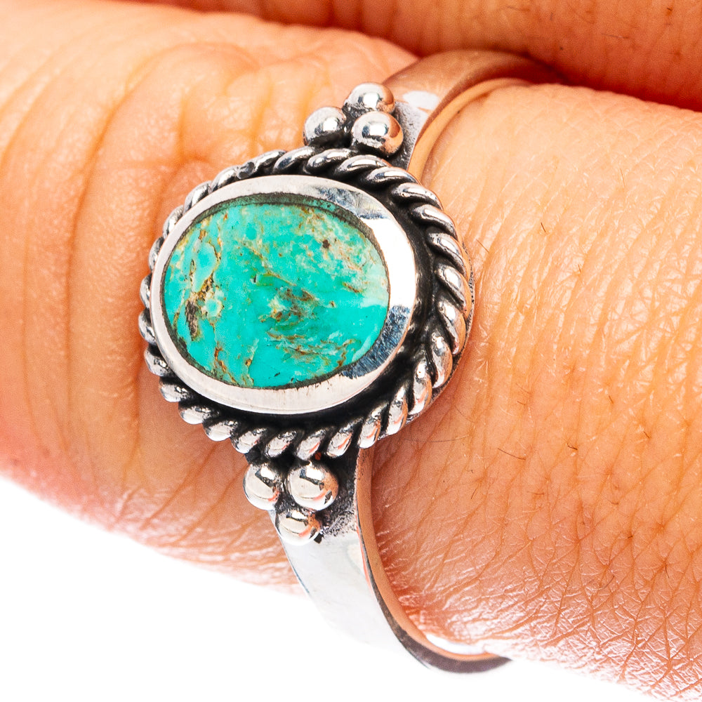 Oval turquoise gemstone ring in 925 sterling silver with ornate rope bezel, size 9.5