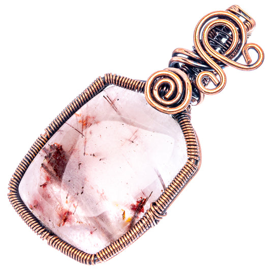 Oxidized copper wire-wrap pendant with teardrop rutilated quartz and raised spiral frame