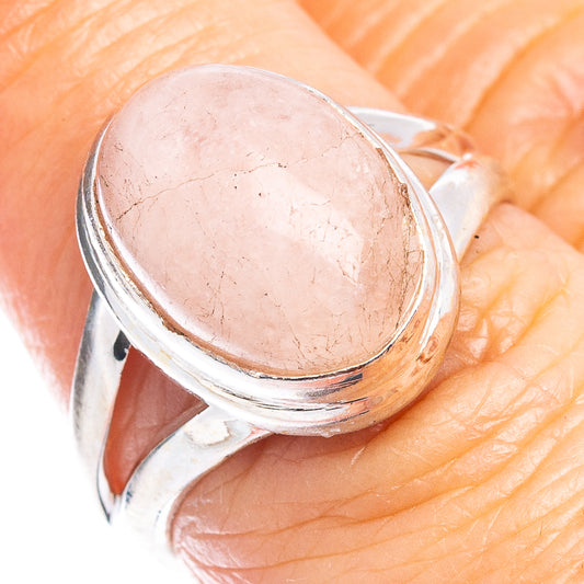 Oval rose quartz cabochon set in .925 sterling silver ring, size 6.75