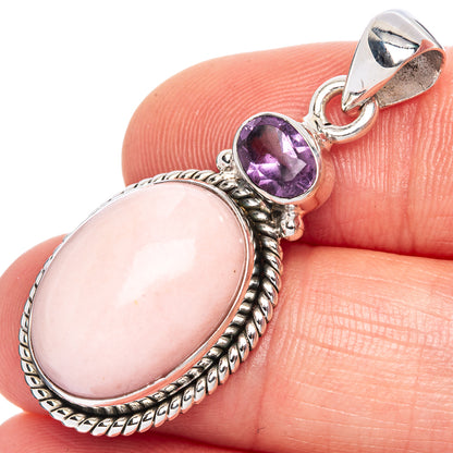 Oval pink opal pendant with purple gemstone accent in 925 sterling silver setting
