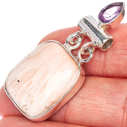 Sterling silver amethyst pendant with pale scolecite cabochon and loop bail