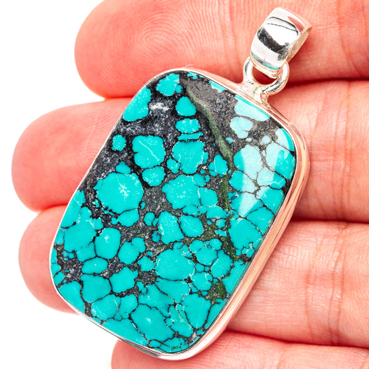 Turquoise pendant with black matrix, rounded rectangular stone, .925 sterling silver bail
