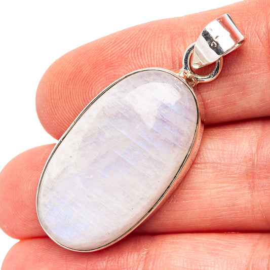 Oval rainbow moonstone pendant in .925 sterling silver bezel with bail