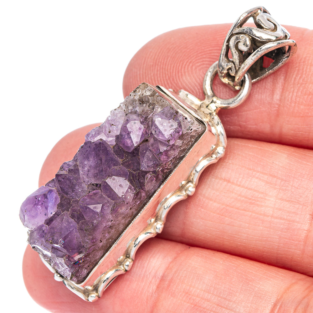 Amethyst crystal pendant in 925 sterling silver frame with ornate bail and purple druzy stone