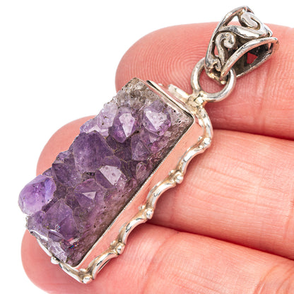 Amethyst crystal pendant in 925 sterling silver frame with ornate bail and purple druzy stone