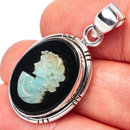 Oval sterling silver opal cameo pendant with lady face in black setting