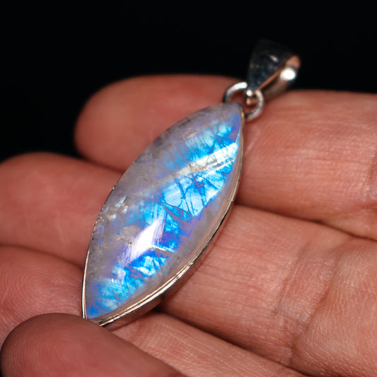 Sterling silver moonstone pendant with teardrop rainbow iridescence