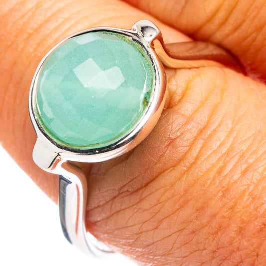 Sterling silver ring featuring an oval aqua-green chalcedony cabochon on top