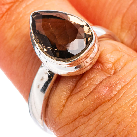 Faceted smoky quartz ring with dark oval stone in .925 sterling silver, close-up