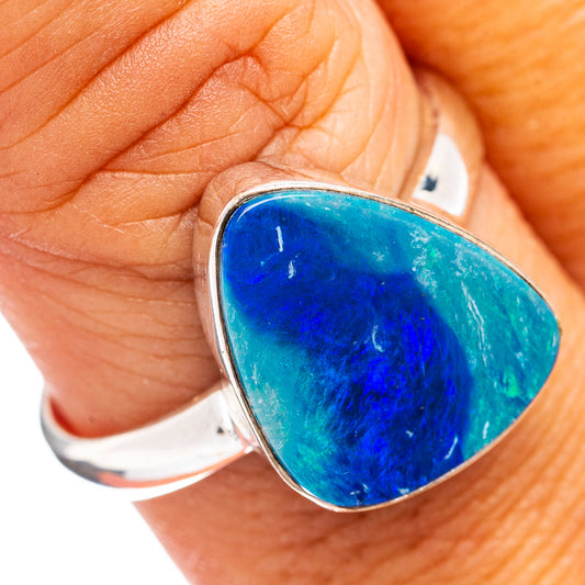 Sterling silver ring with blue teardrop opal gemstone bezel setting