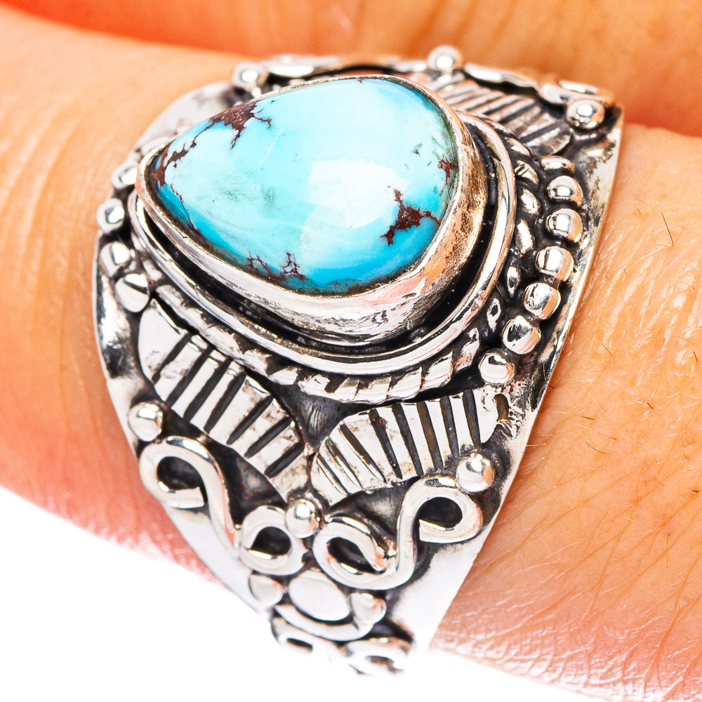 Silver-tone turquoise oval ring with ornate carved setting