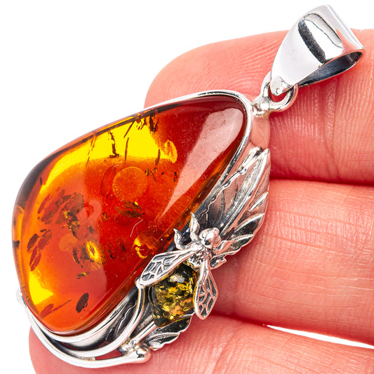 Teardrop Baltic amber bee pendant in .925 sterling silver with bee and silver frame