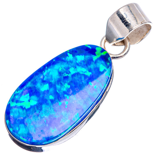 Sterling silver lab opal pendant, blue teardrop cabochon with open bail