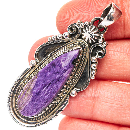 Sterling silver charoite pendant, oval purple gemstone in ornate frame