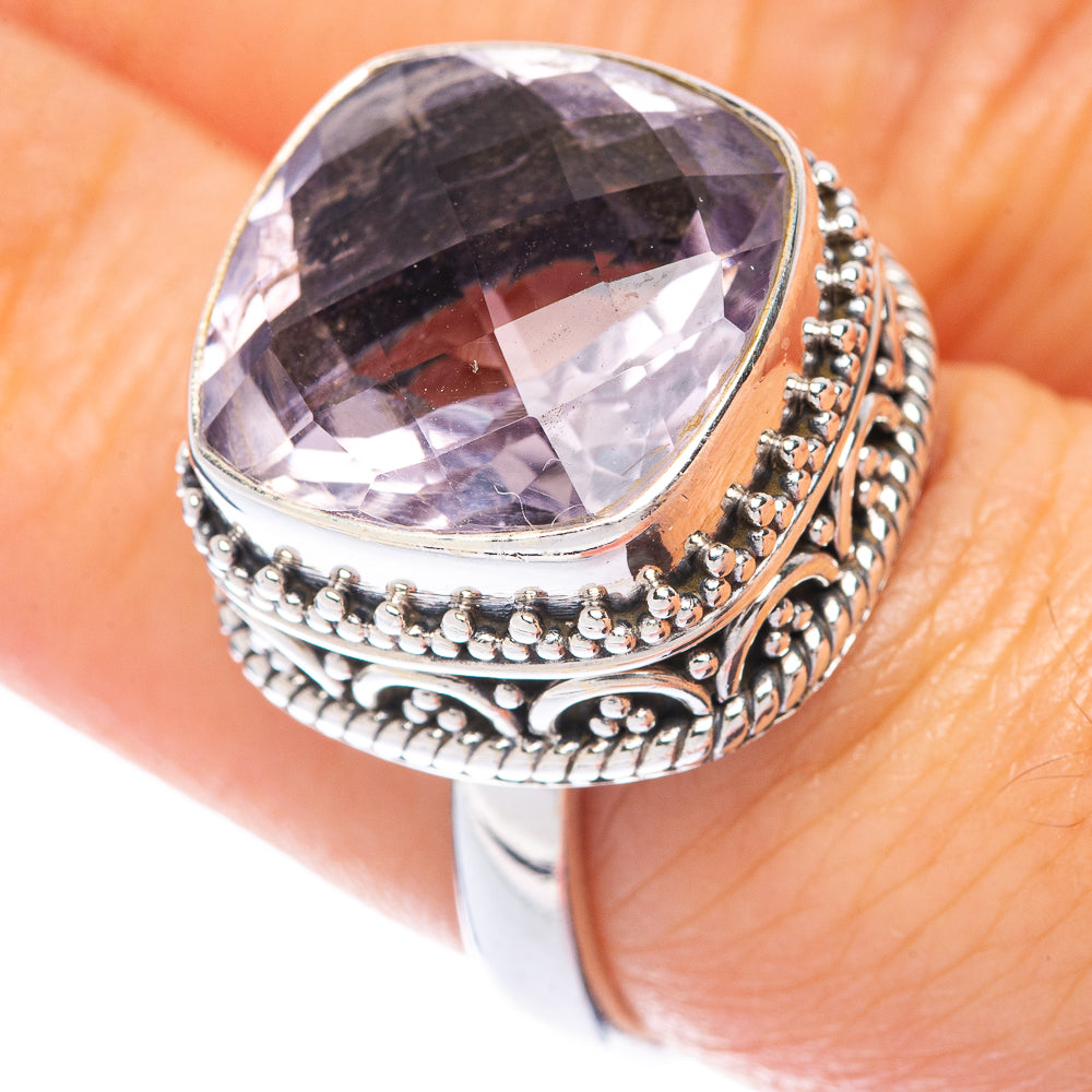 Sterling silver amethyst ring with large oval faceted gemstone and bead-textured band