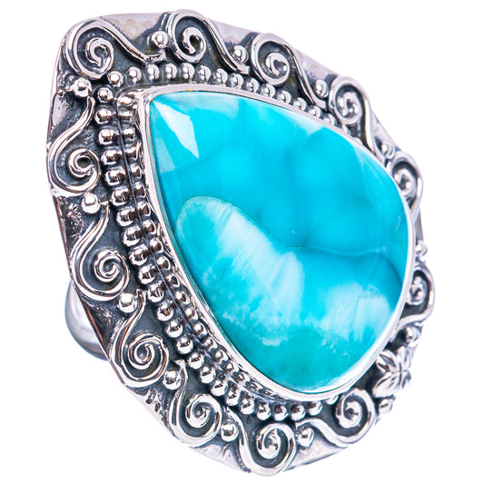 Blue Larimar teardrop oval sterling silver ring with filigree scroll border
