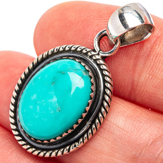 Close-up oval turquoise cabochon pendant with rope-edge .925 sterling silver bezel