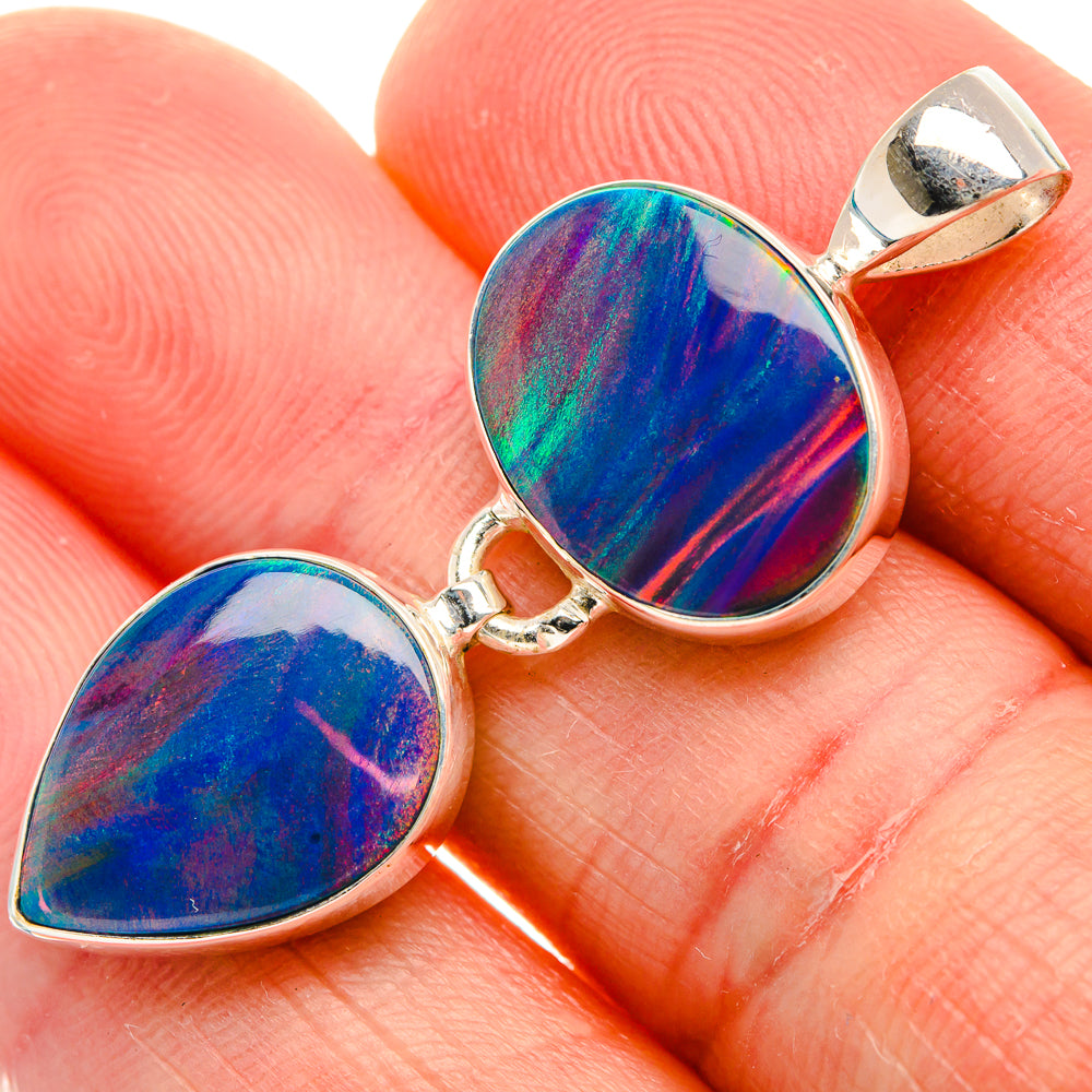 Sterling silver opal heart pendant with iridescent blue/purple stone, two linked hearts