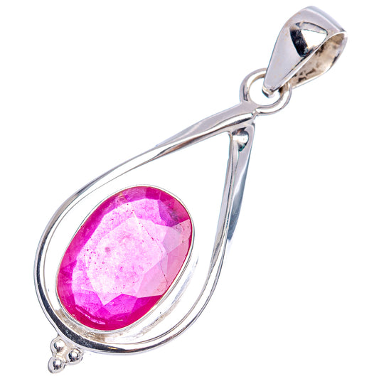 Sterling silver ruby pendant with oval purple-red gemstone in teardrop frame and loop bail