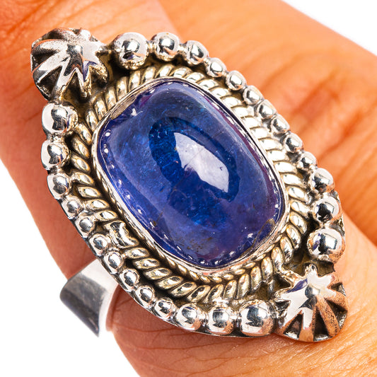 Oval blue gemstone ring in polished sterling silver with scalloped bead border