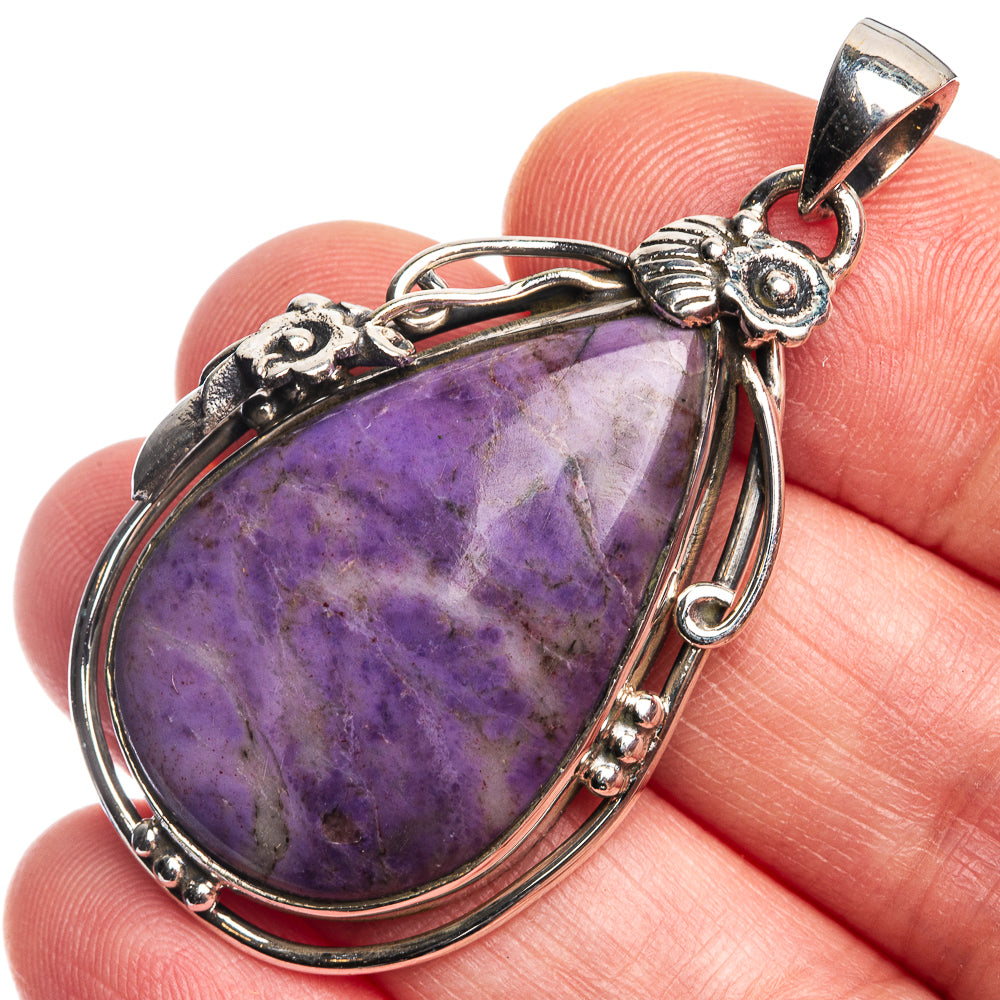 Charoite pendant in 925 sterling silver with teardrop purple stone and ornate bail