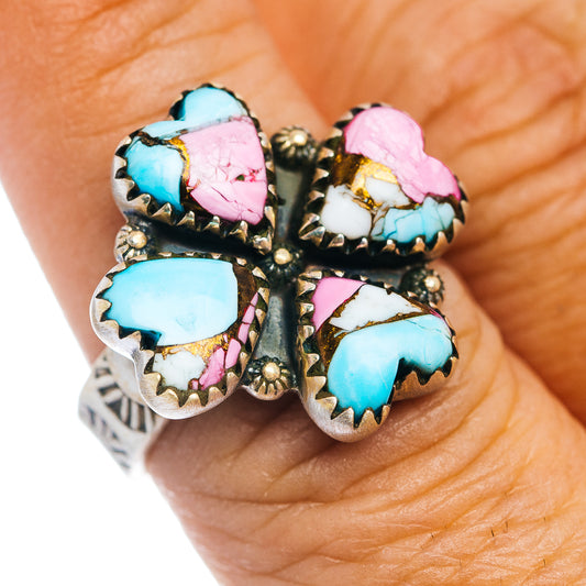 Southwestern heart ring with turquoise, pink, and white stone inlays on silver band