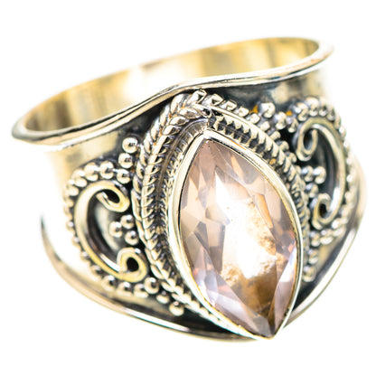 Sterling silver oval rose quartz ring, detailed side filigree and prong bezel