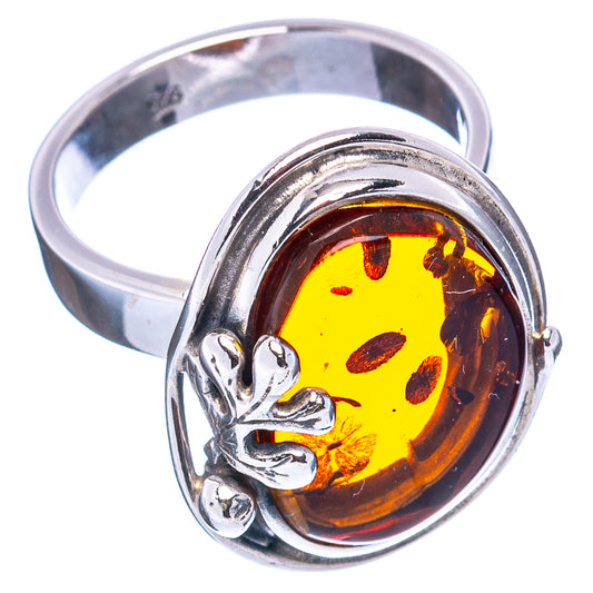 Adjustable .925 sterling silver amber leaf ring with oval yellow amber resin cabochon