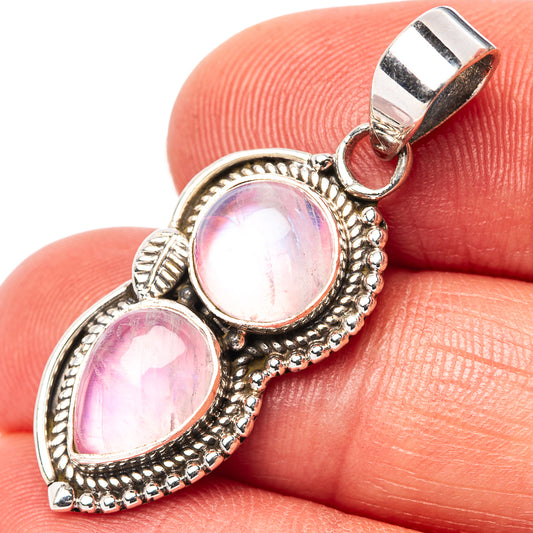 Pink moonstone pendant with two oval cabochons in .925 sterling silver frame